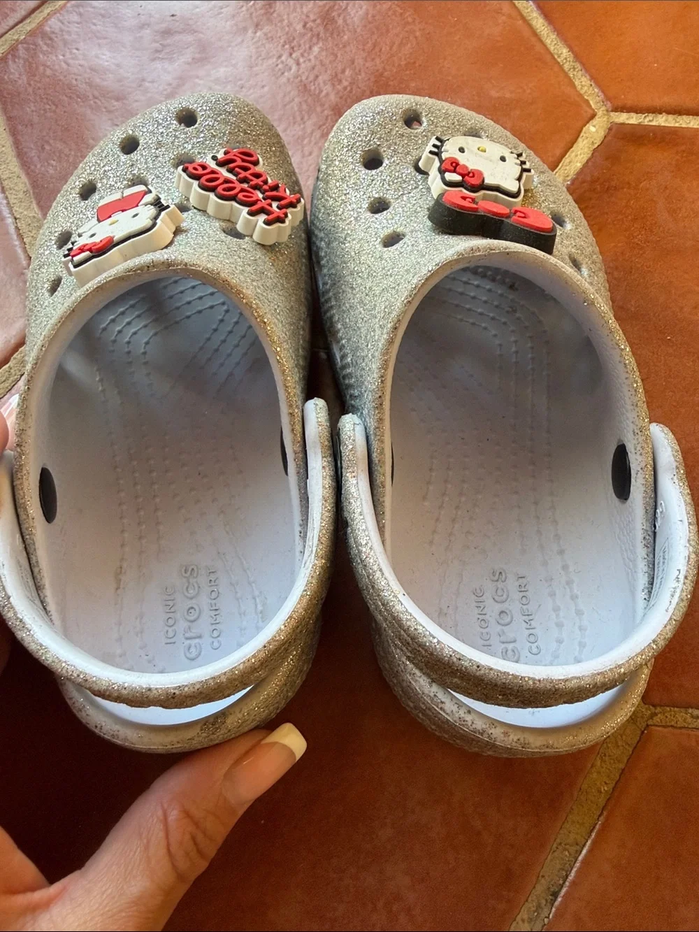 Hello Kitty Glitter crocs in Silver with Red Accents